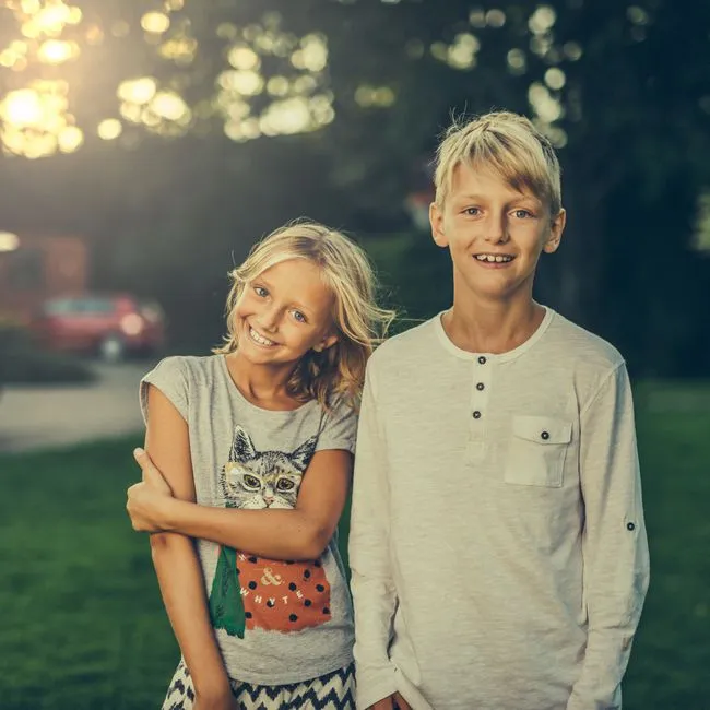 Two children playing together outdoors